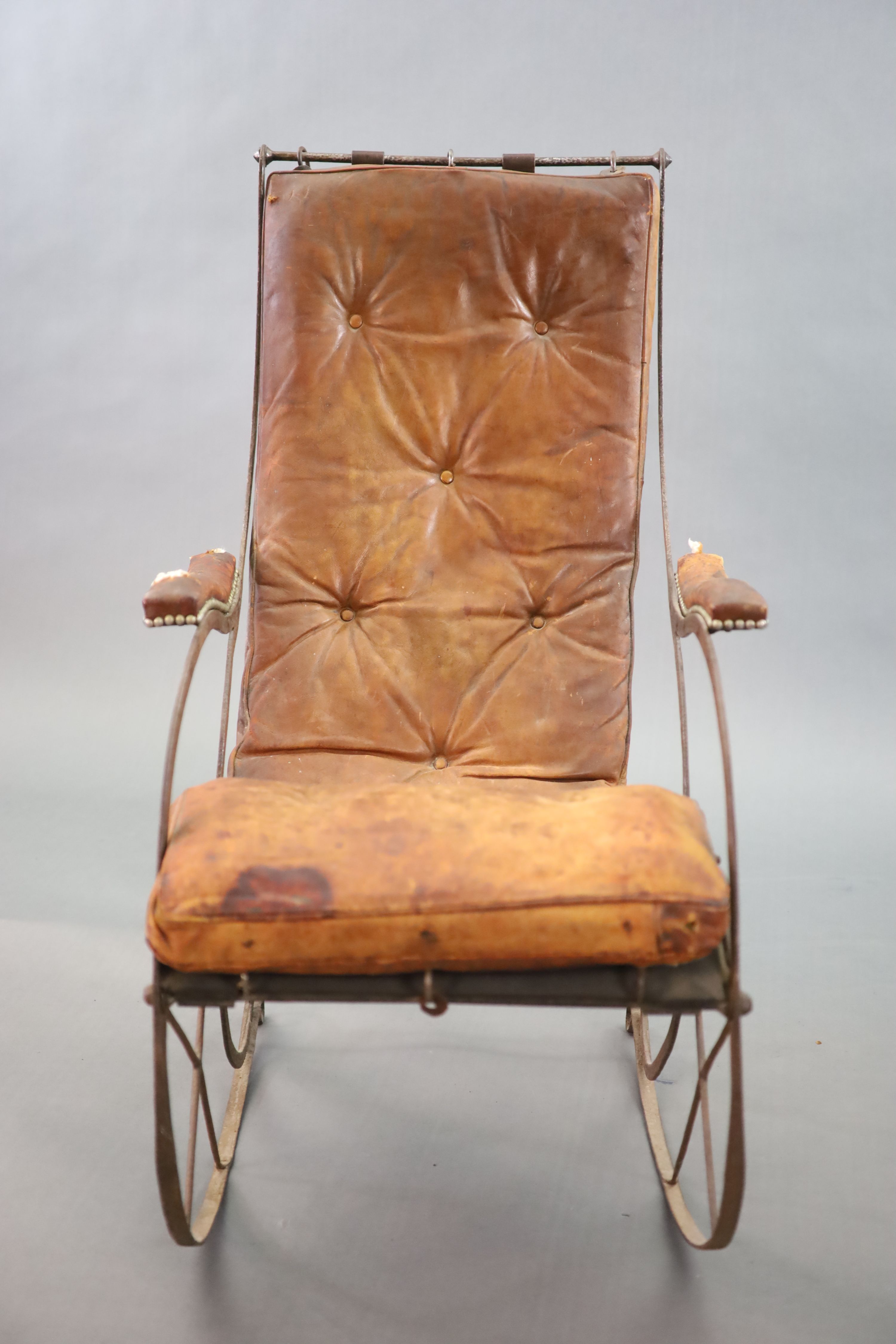 After R.W Winfield & Co, Birmingham, a mid 19th century rocking chair, 59cm wide, 83cm deep, 105cm high.